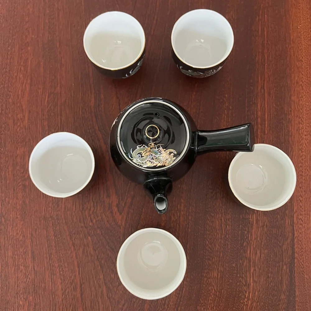 Japanese 7 piece tea set with 5 cups and a tea pot in gold dragon pattern